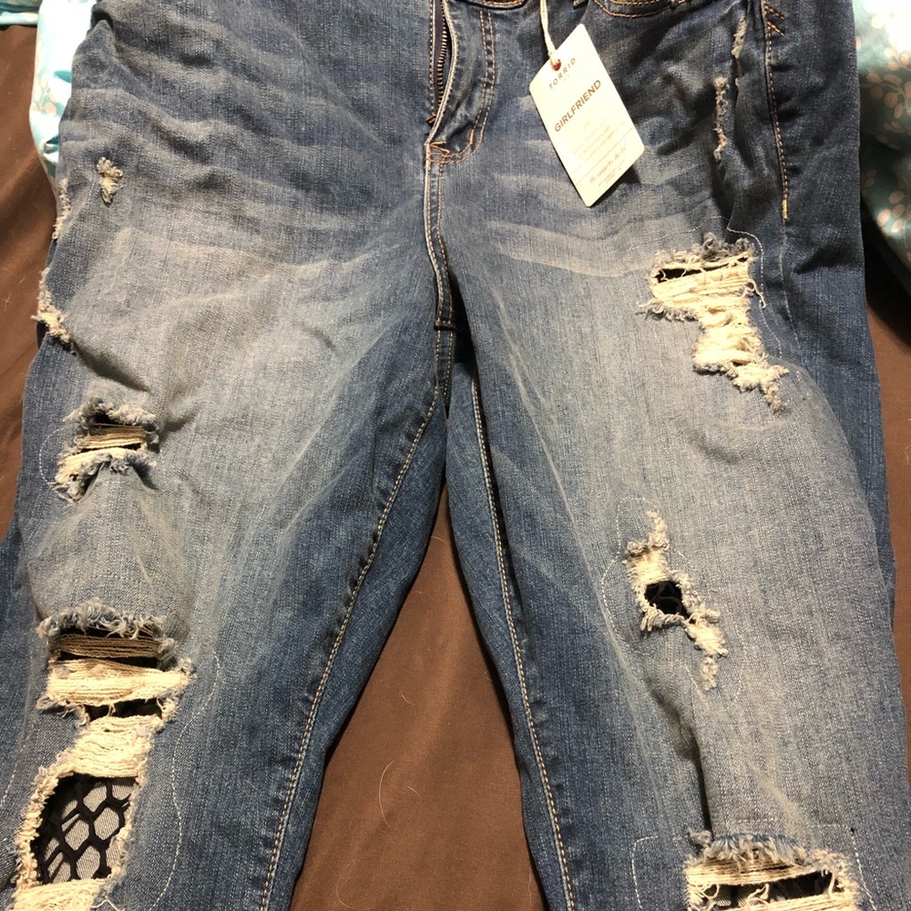 Torrid girlfriend jeans with fishnet size 14
